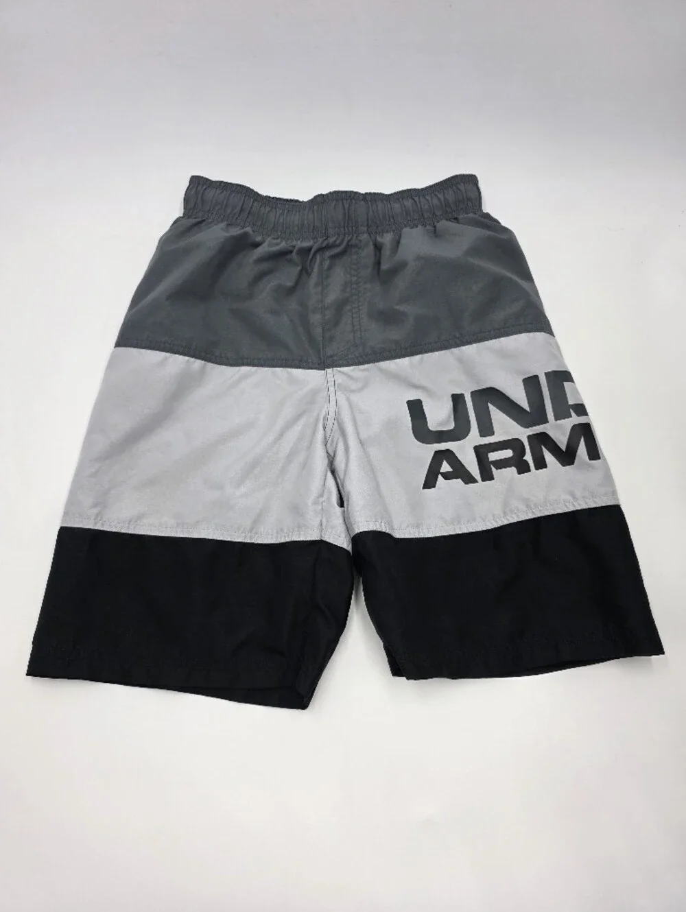 Under Armour boys' rashguard and swim trunks size M